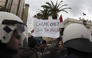 Illustration for article titled Two Words Helping Overthrow A Government